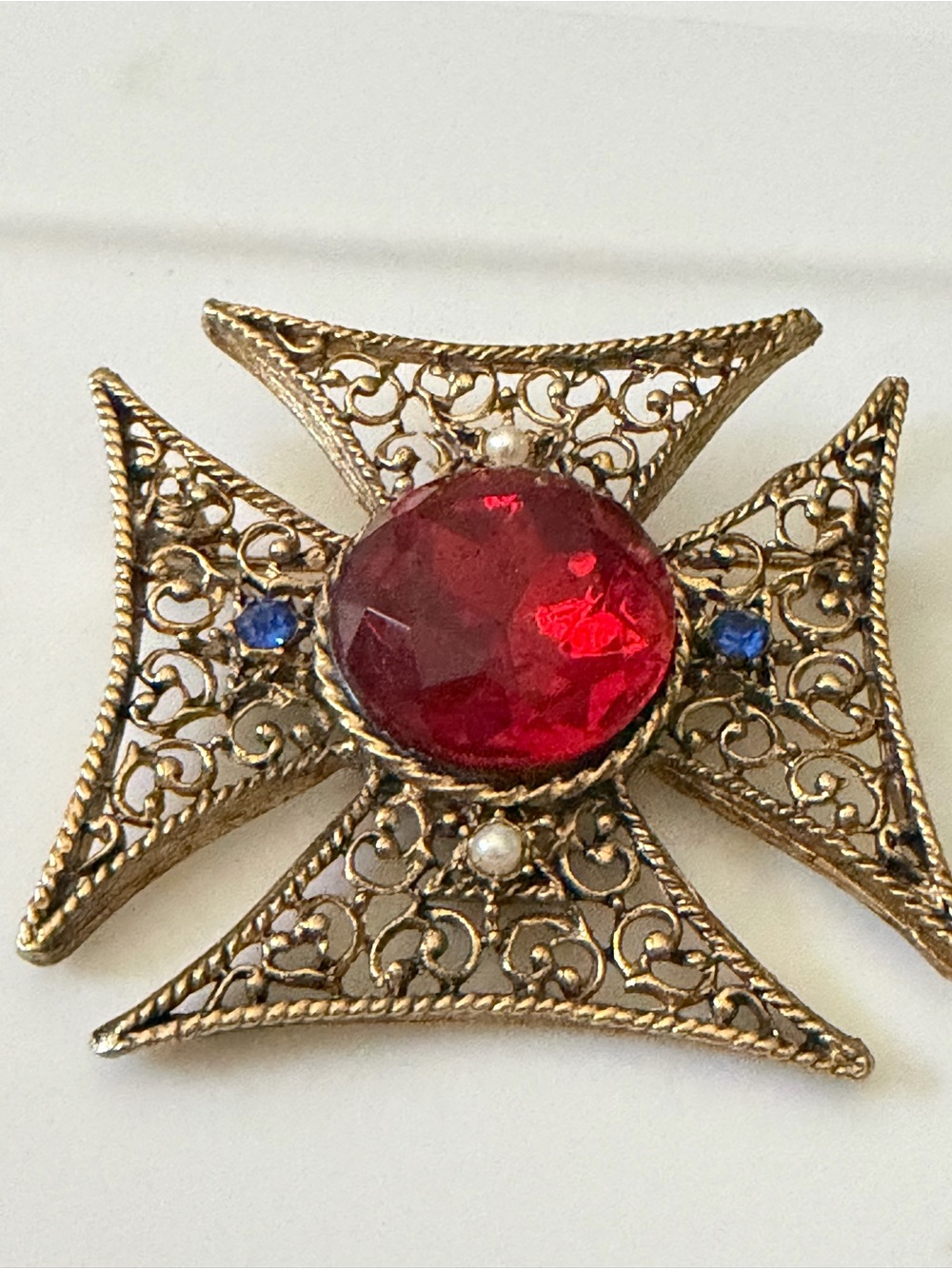 Gold-Tone Filigree Cross Brooch with Red Glass Center. 1 3/4” Large
